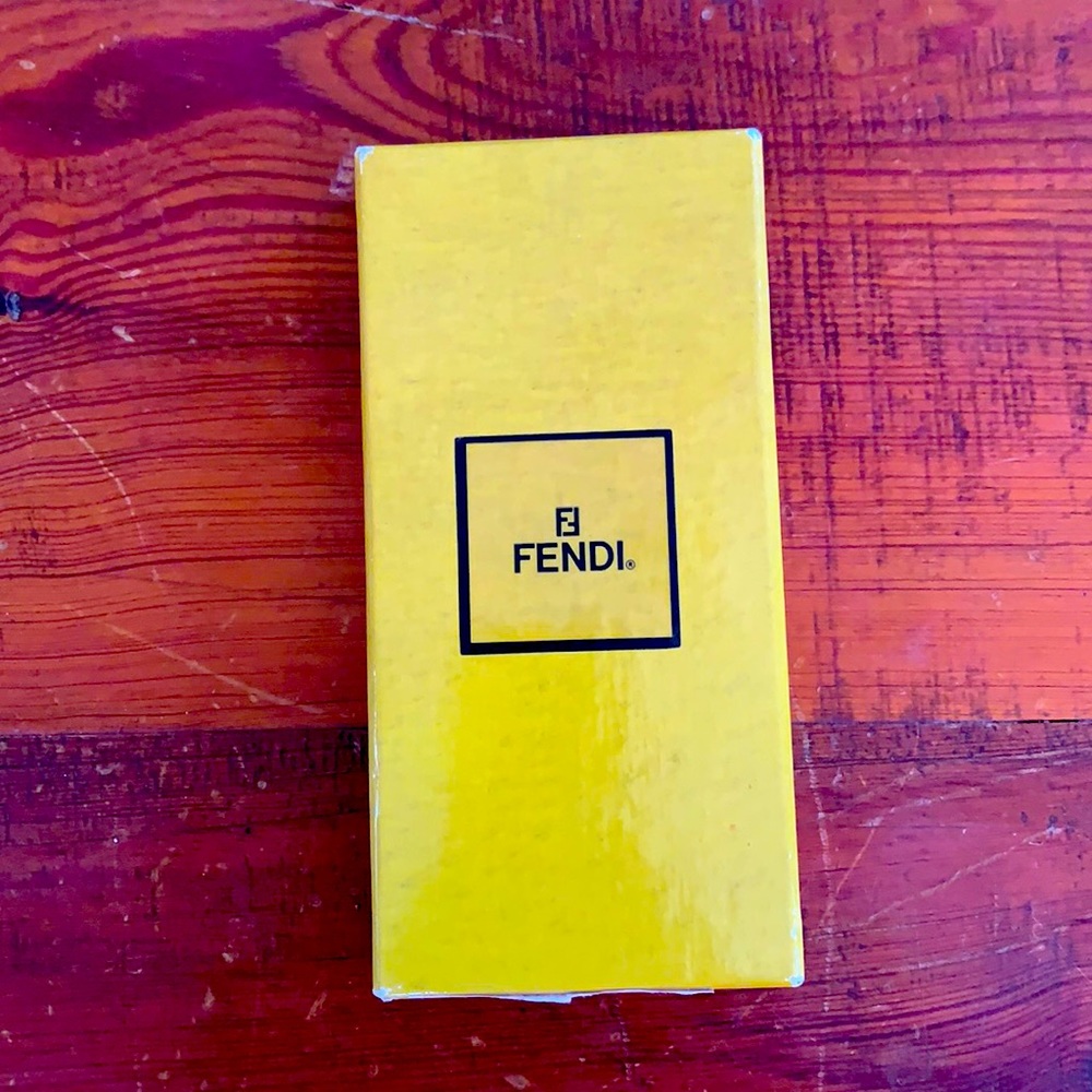 Empty yellow and black Fendi box; held key chain